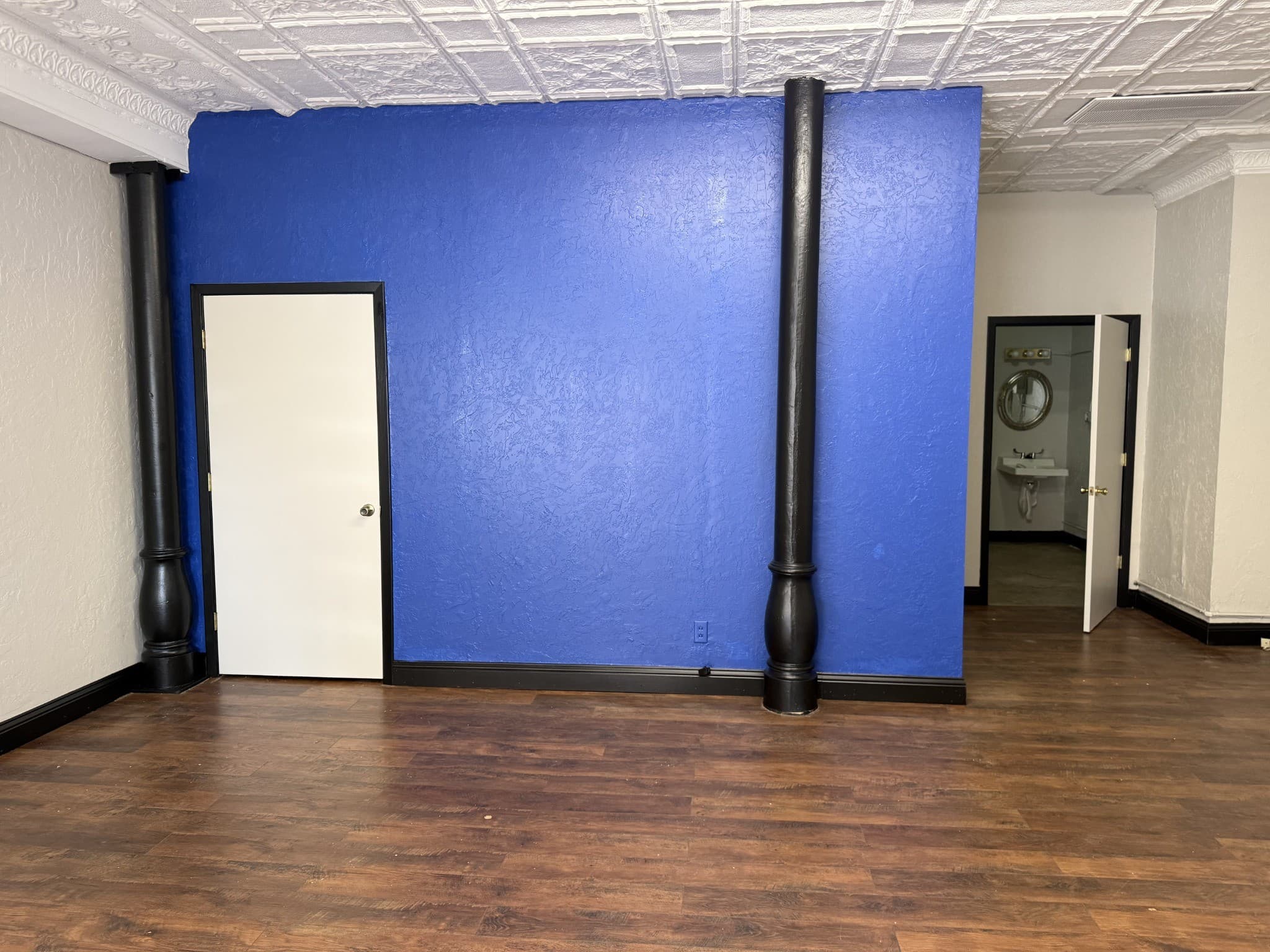 Blue accent wall & contrasting trim — Childress, Texas office project